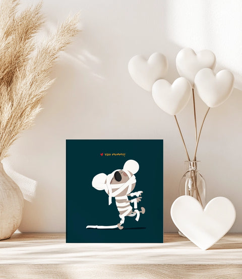 Square greeting card with a dark blue background for Australian mum, featuring a koala dressed as a mummy and the text I love you mummy