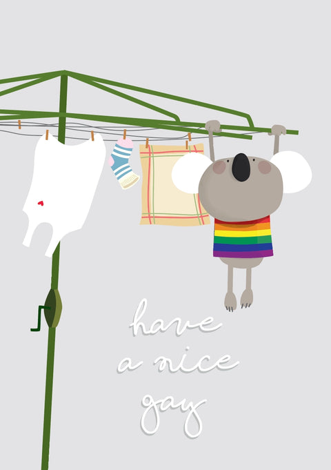 A koala hanging from an Australian Hills Hoist, wearing a gay-friendly t-shirt with the playful saying "Have a nice gay"